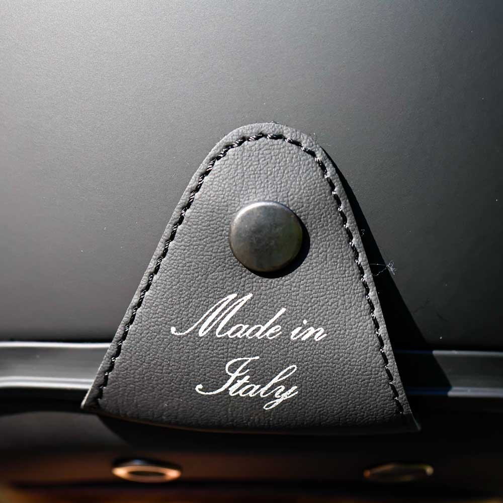 closeup of leather made in italy badge on matte helmet