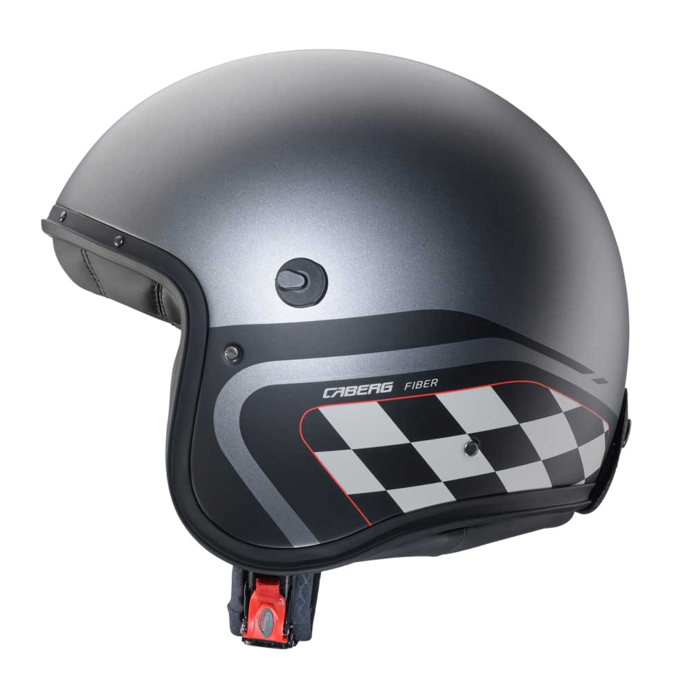 side of grey gun metal motorbike helmet with open face design and checkers in black and white