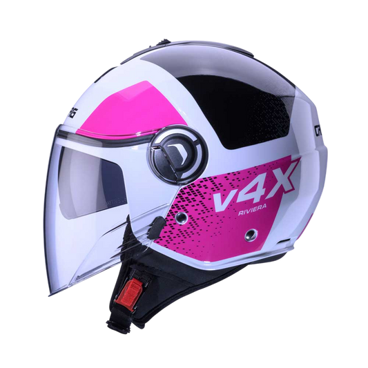 Side view of a white Caberg Riviera V4X open-face motorcycle helmet, featuring a bold fuchsia pink graphic design, integrated sun visor, and a clear full-face visor.