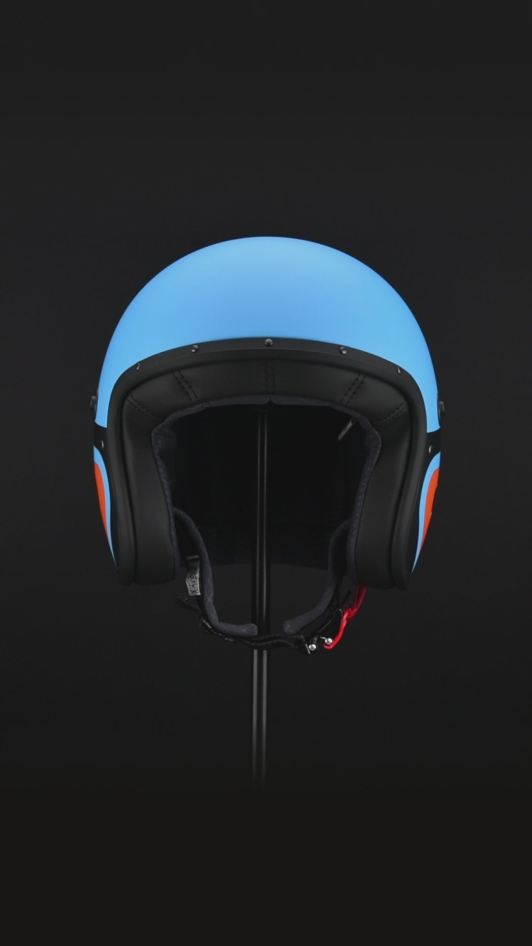 360 degree video of matte blue and orange open face caberg motorbike helmet in a race style design