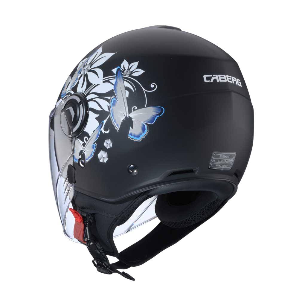 Rear view of the matt black Caberg Riviera V4X Mia helmet, highlighting the white and blue flower pattern and the helmet's contoured rear styling.